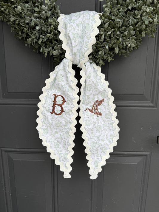 Green floral wreath sash